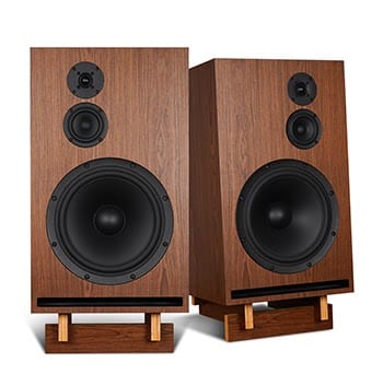 Pair of walnut-veneer Gema three-way speakers on wooden plinths, each with tweeter, midrange and large woofer.